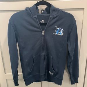 Disney Parks size large 60th anniversary zip up navy sweatshirt.  EUC